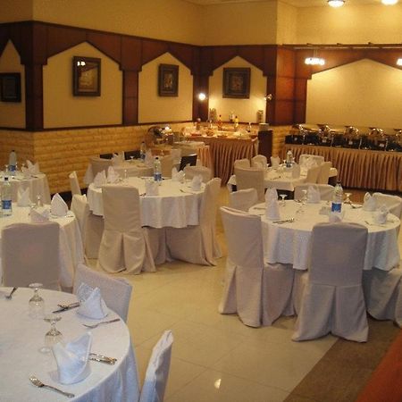 L'Arabia Hotel Apartments Abu Dzabi Étterem fotó