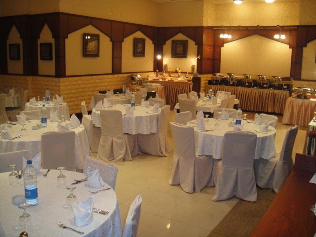 L'Arabia Hotel Apartments Abu Dzabi Étterem fotó